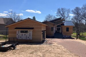 Redemption Construction general contractor in all things in home building and renovations has over 40 years experience in custom built homes with wood siding to be stained in Wisconsin Rapids