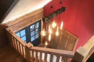 Rustic decorative handing lights in new home entry way by Redemption Construction general contractor in Wisconsin Rapids